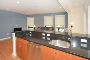 Luxury Apartment, 1 Bedroom, Kitchen | Private kitchen | Full-size fridge, microwave, stovetop, coffee/tea maker - Evolve Fenway Diamond (Boston)
