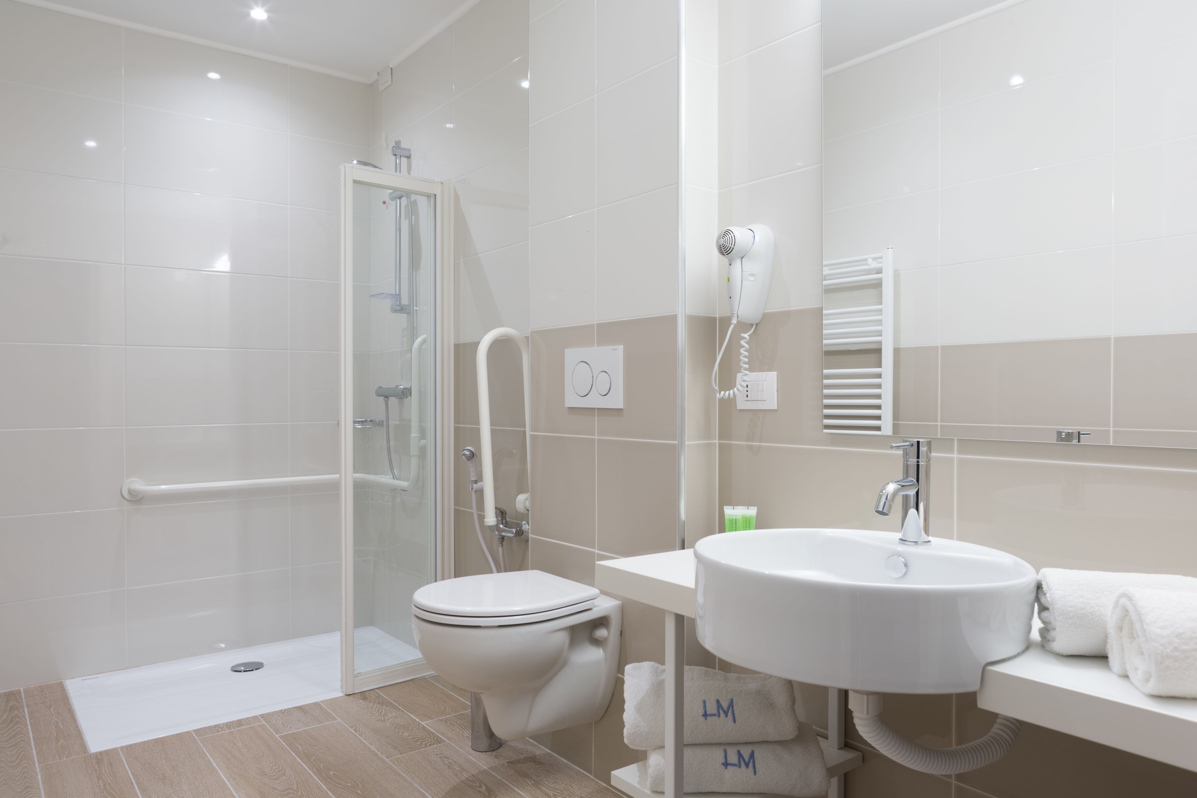 shower, designer toiletries, hair dryer, bathrobes