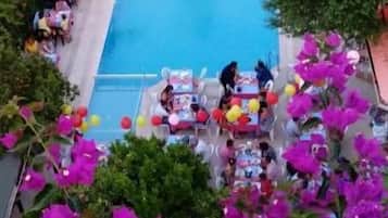 Outdoor pool, pool umbrellas, sun loungers