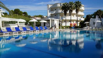 Outdoor pool, pool umbrellas, pool loungers