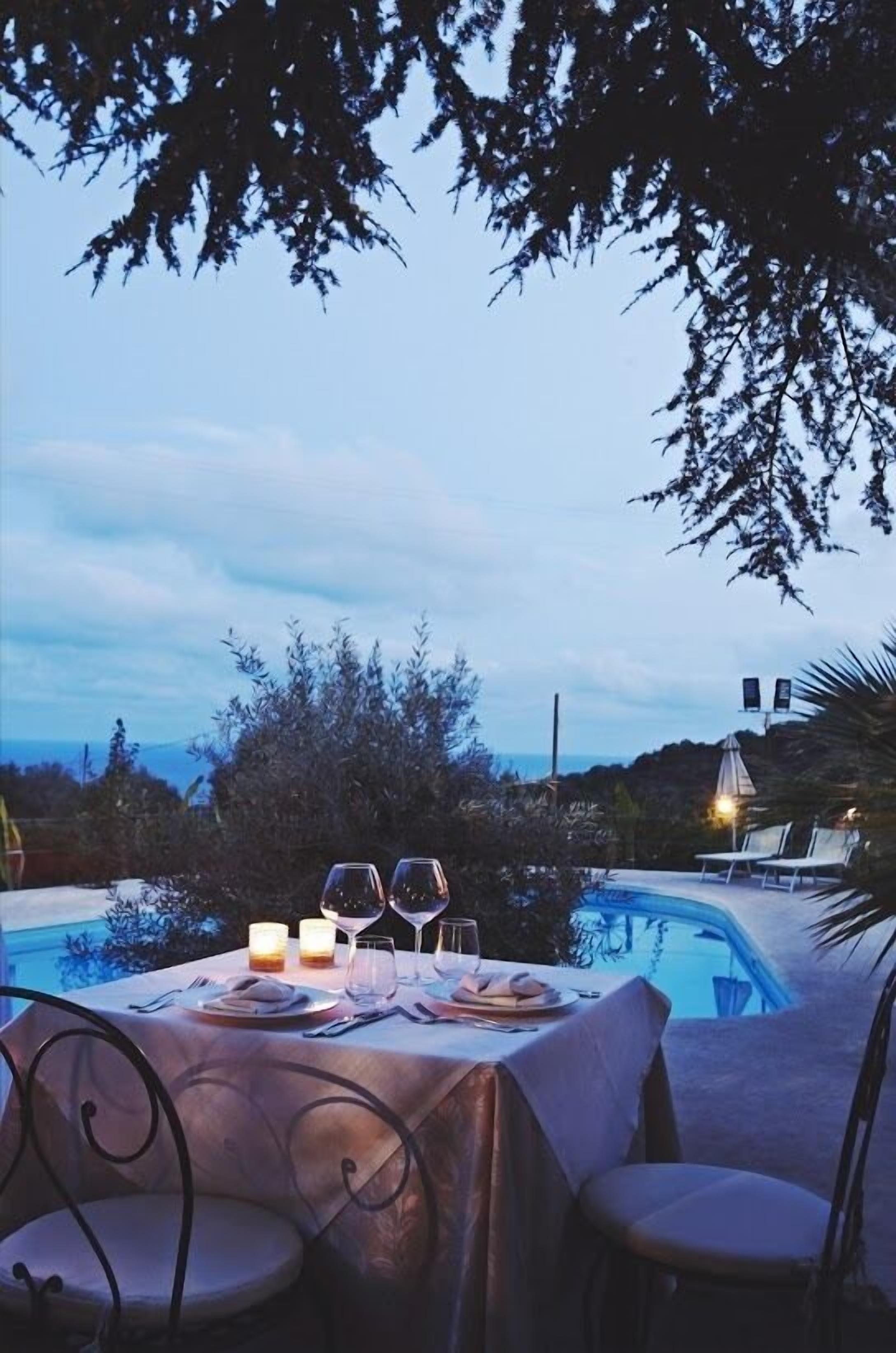 breakfast, lunch served; local and international cuisine, pool views