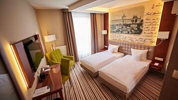 Ropa de cama de alta calidad y minibar