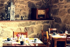 Breakfast, lunch, dinner served; local cuisine, garden views