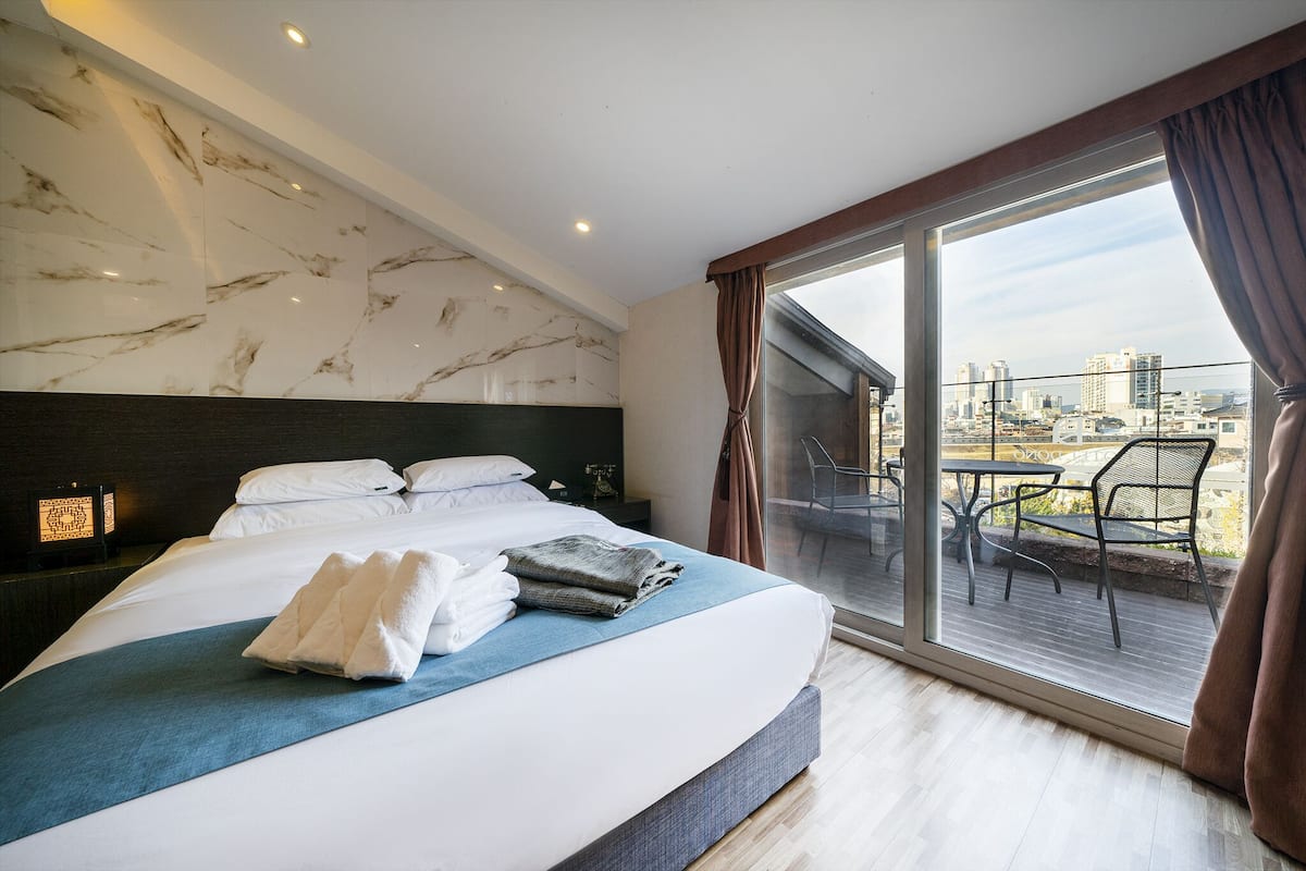 Design Suite, 1 Queen Bed, Non Smoking, City View | 1 bedroom, premium bedding, down comforters, minibar