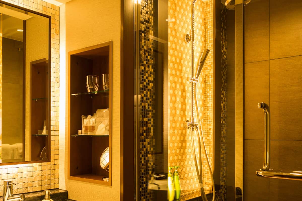 hair dryer, slippers, bidet, towels