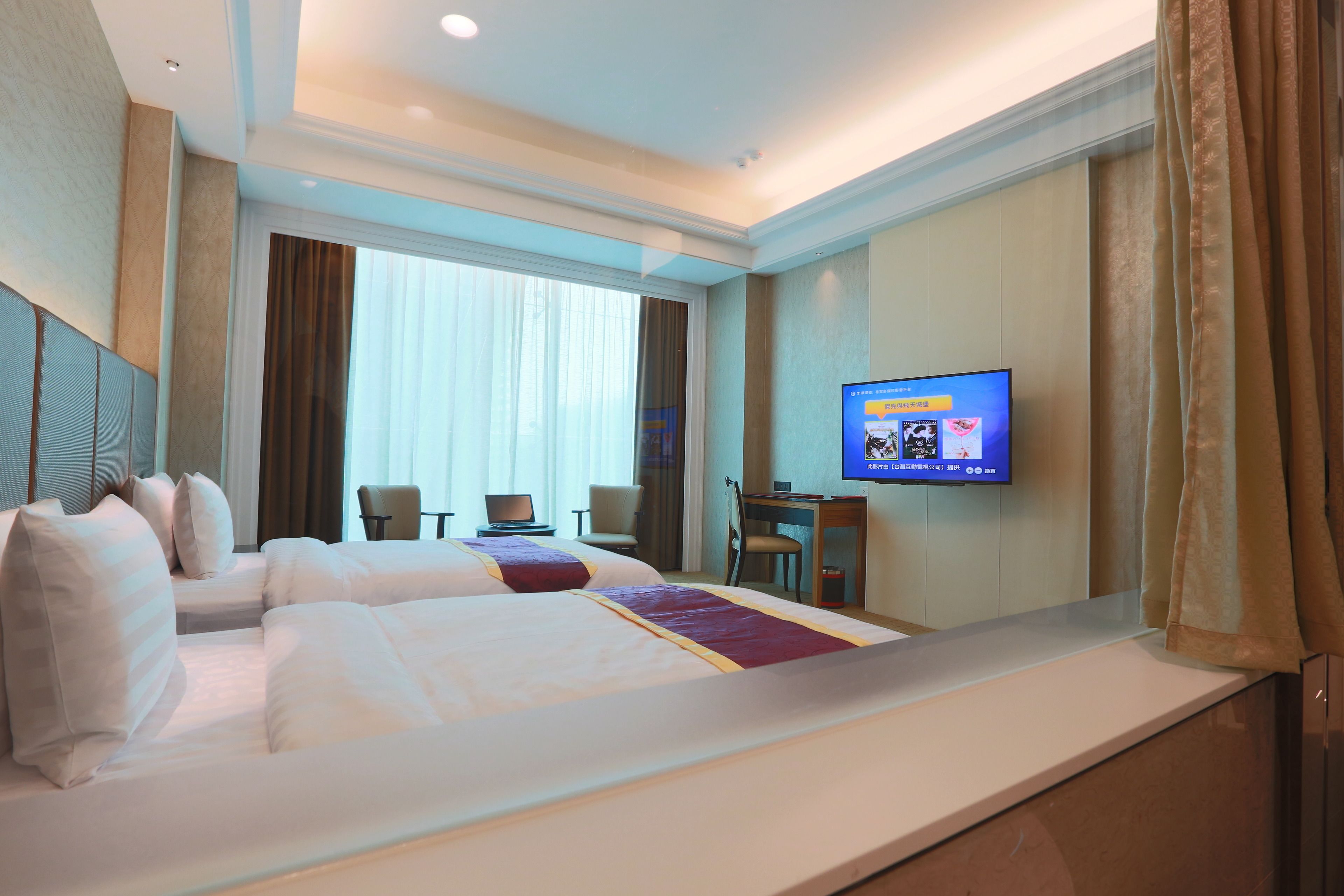 business twin room | in-room safe, desk, blackout curtains, iron/ironing board