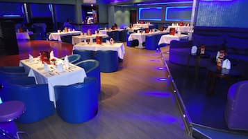 4 restaurants, breakfast, lunch, dinner served; Indian cuisine