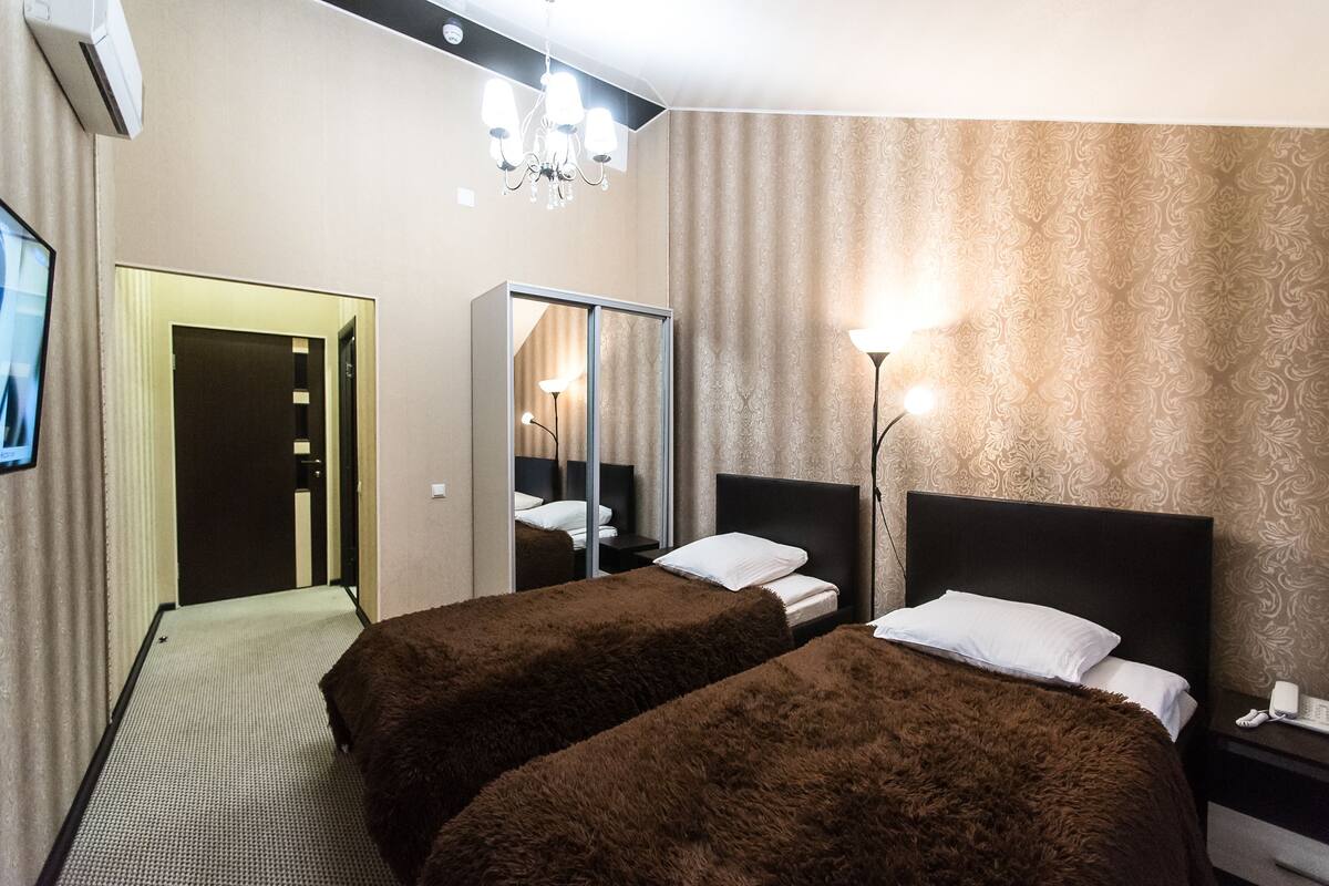 Standard-Zweibettzimmer, 2 Einzelbetten | Hochwertige Bettwaren, schallisolierte Zimmer, Bügeleisen/Bügelbrett