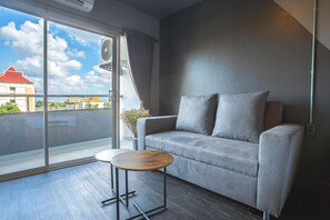 Desk, laptop workspace, blackout drapes, iron/ironing board - Get Zleep Premium Budget Hotel (Chiang Mai)