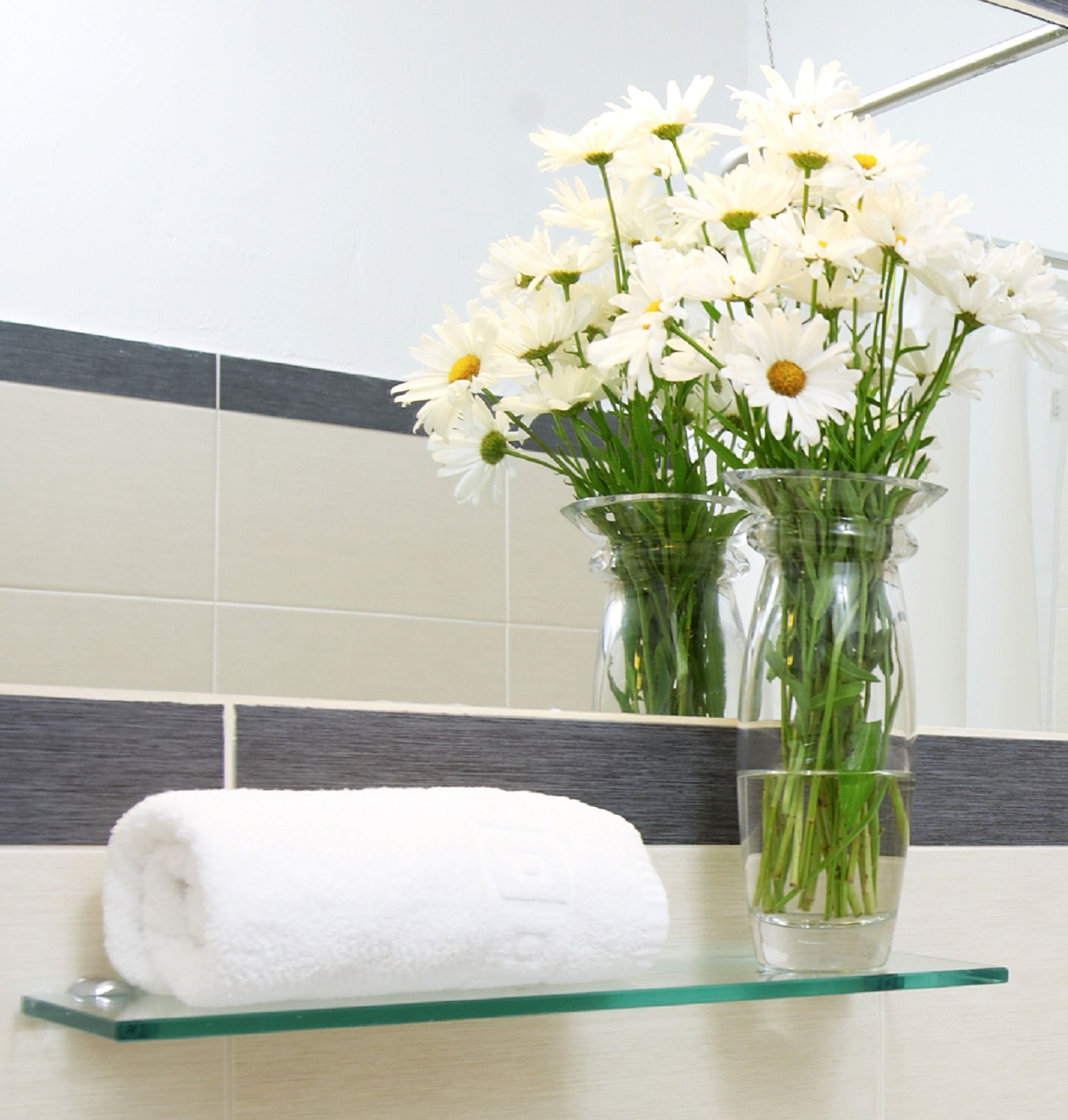 twin room, partial sea view | bathroom | shower, free toiletries, hair dryer, bathrobes