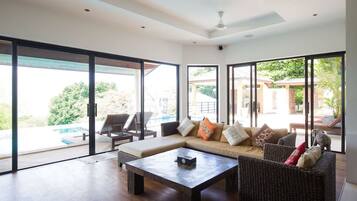 Panoramic Villa, 4 Bedrooms, Sea View | Living room | Flat-screen TV