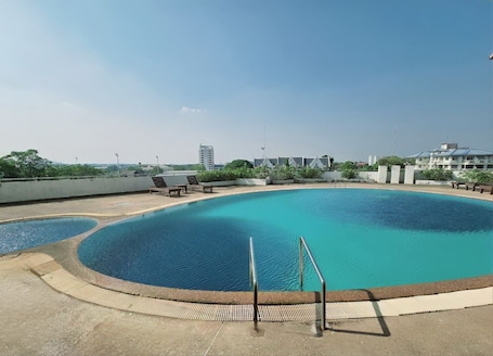 Outdoor pool, open 7:00 AM to 9:00 PM, pool umbrellas, sun loungers