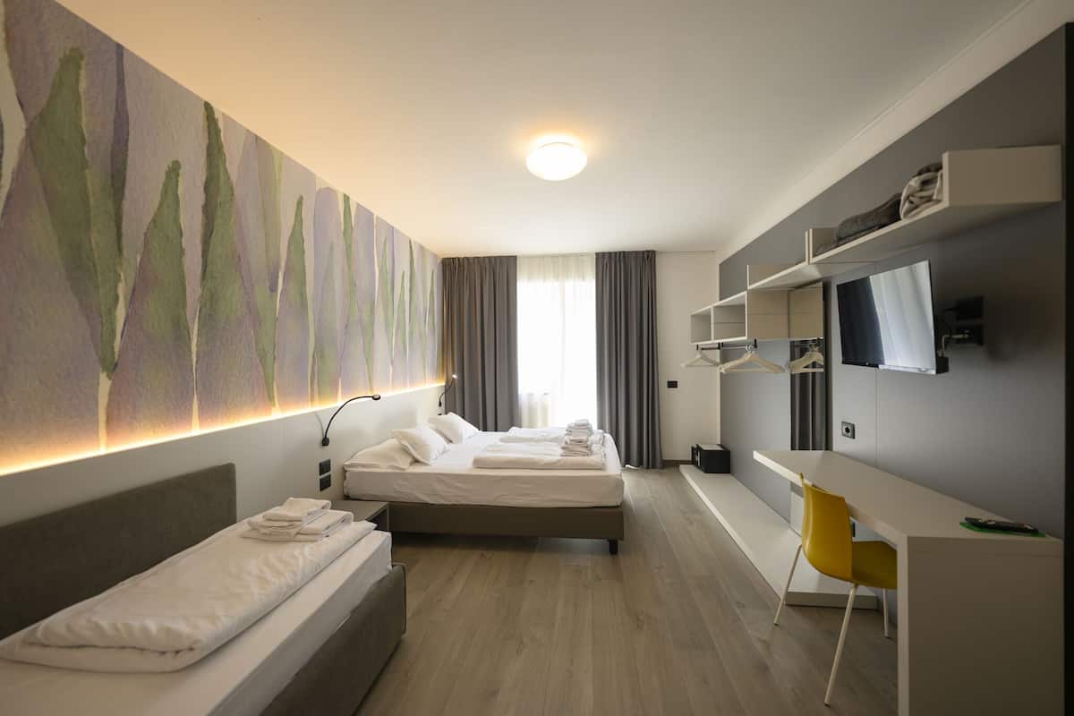 superior triple room | premium bedding, in-room safe, desk, free wifi