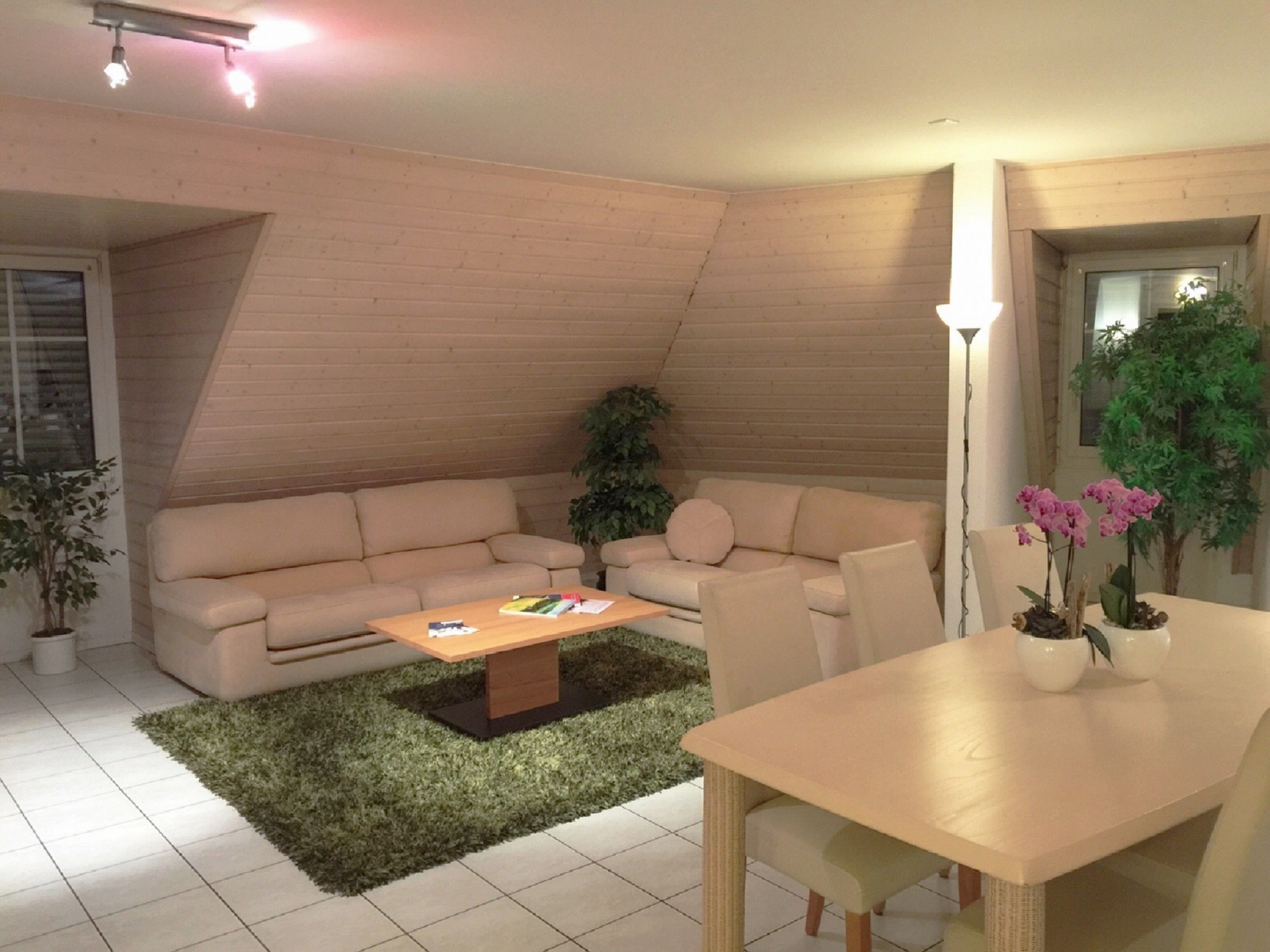 deluxe double room | living room | flat-screen tv