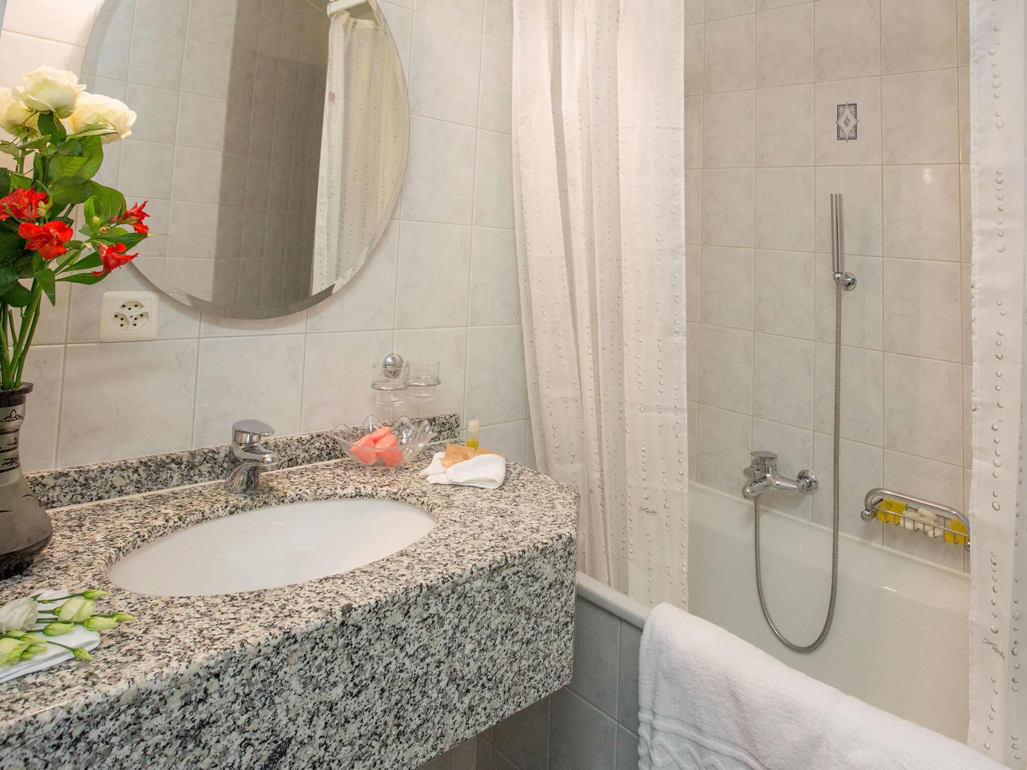 shower, free toiletries, hair dryer, towels