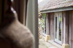 Family Suite, 2 Bedrooms, Garden Area | Premium bedding, pillow-top beds, iron/ironing board, free WiFi