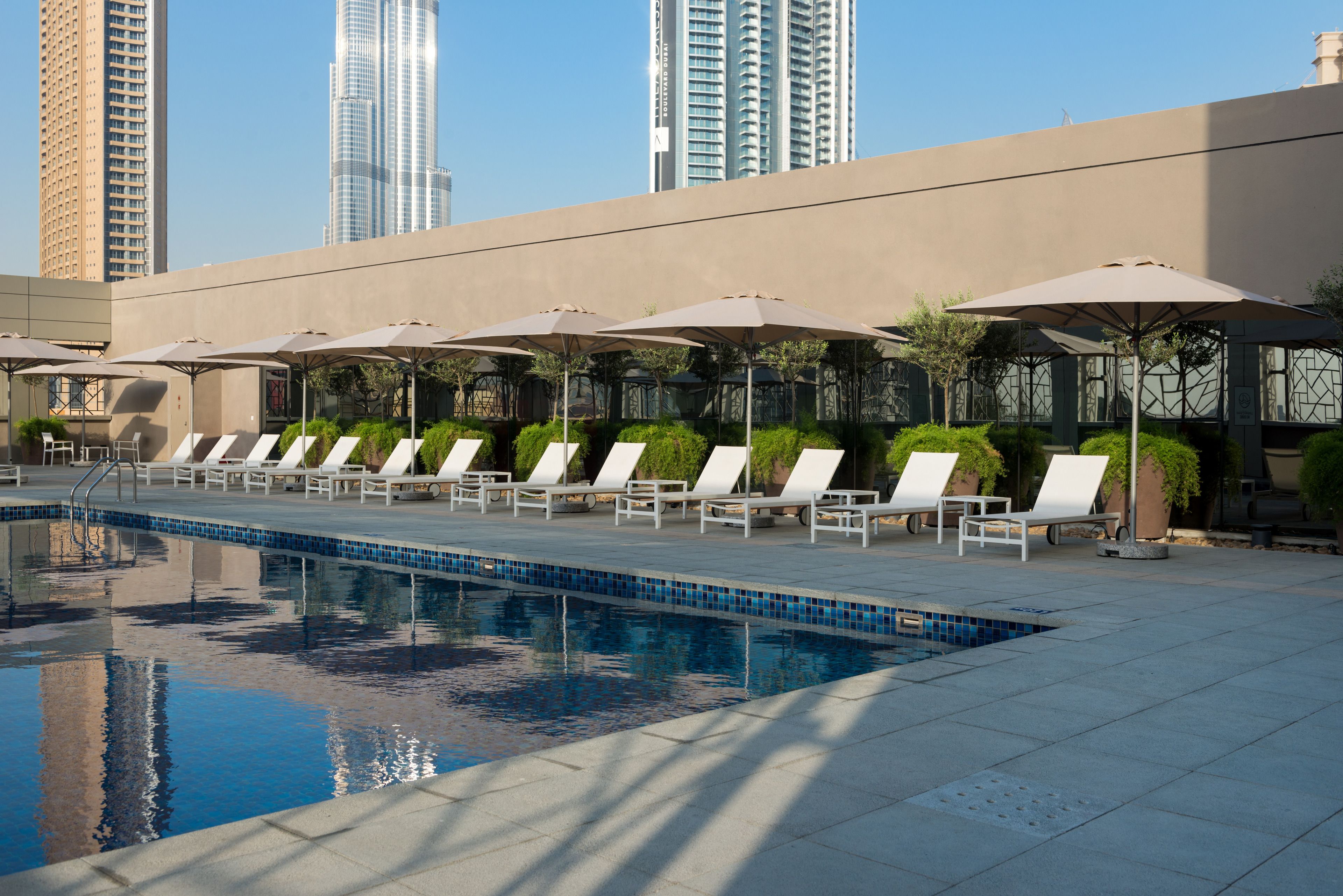 Outdoor pool, pool umbrellas, pool loungers