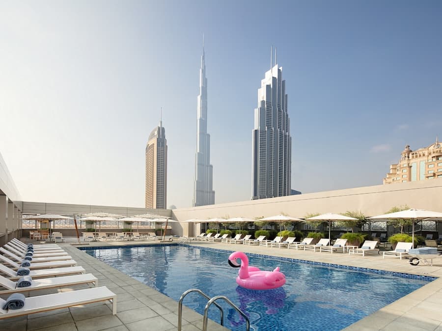 Outdoor pool, pool umbrellas, sun loungers
