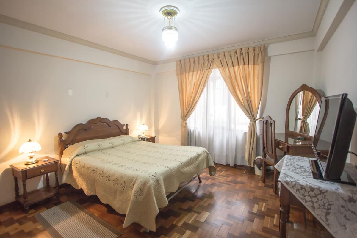 Blackout drapes, cribs (free), WiFi (free), bed sheets