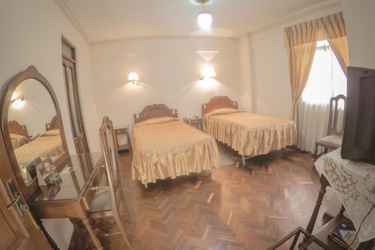 Standaard Twin kamer | Verduisterende gordijnen, gratis babybedden, gratis wifi, beddengoed