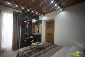Quarto solteiro | Roupas de cama premium, frigobar (abastecido com alguns itens grátis)