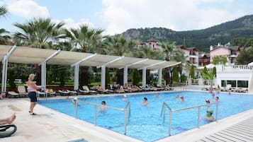 Indoor pool, outdoor pool, pool umbrellas, sun loungers