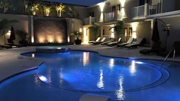 2 outdoor pools, open 9:00 AM to 9:00 PM, pool umbrellas, pool loungers