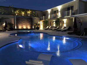 2 outdoor pools, open 9:00 AM to 9:00 PM, pool umbrellas, sun loungers - The Lodgings Hotel SureStay Collection by Best Western (Providenciales)