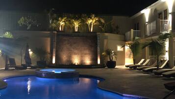 2 outdoor pools, open 9:00 AM to 9:00 PM, pool umbrellas, pool loungers