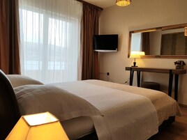 Biancheria da letto di alta qualità, minibar, una scrivania