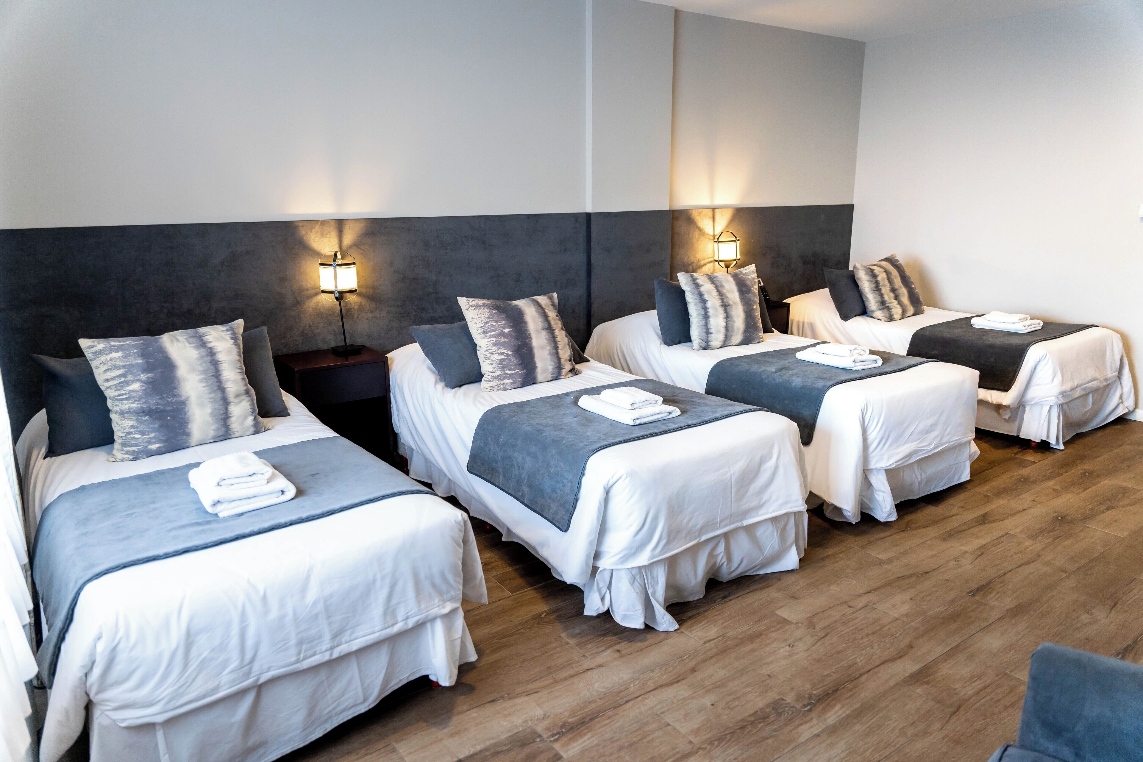 standard quadruple room | minibar, in-room safe, individually decorated, individually furnished