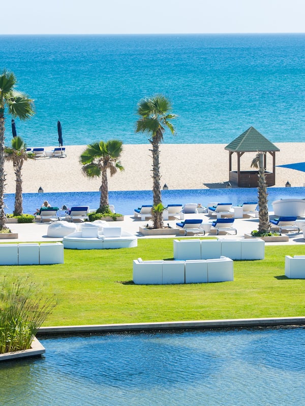 On the beach, sun loungers, beach umbrellas, beach towels