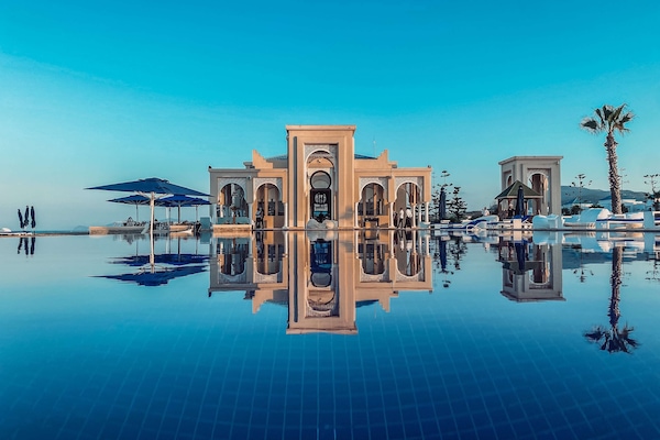 Indoor pool, outdoor pool, pool umbrellas, sun loungers