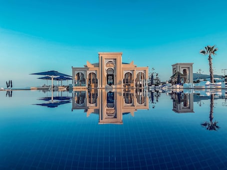 Indoor pool, outdoor pool, pool umbrellas, sun loungers