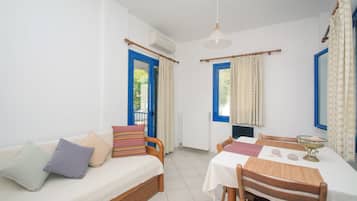 Apartment, Balcony | Living area | Flat-screen TV