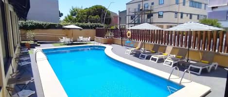 Outdoor pool, open 10:00 AM to 9:00 PM, pool umbrellas, sun loungers