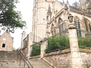 Experience the grandeur of this historic building with its Gothic architectural style, featuring pointed arches and intricate details.
