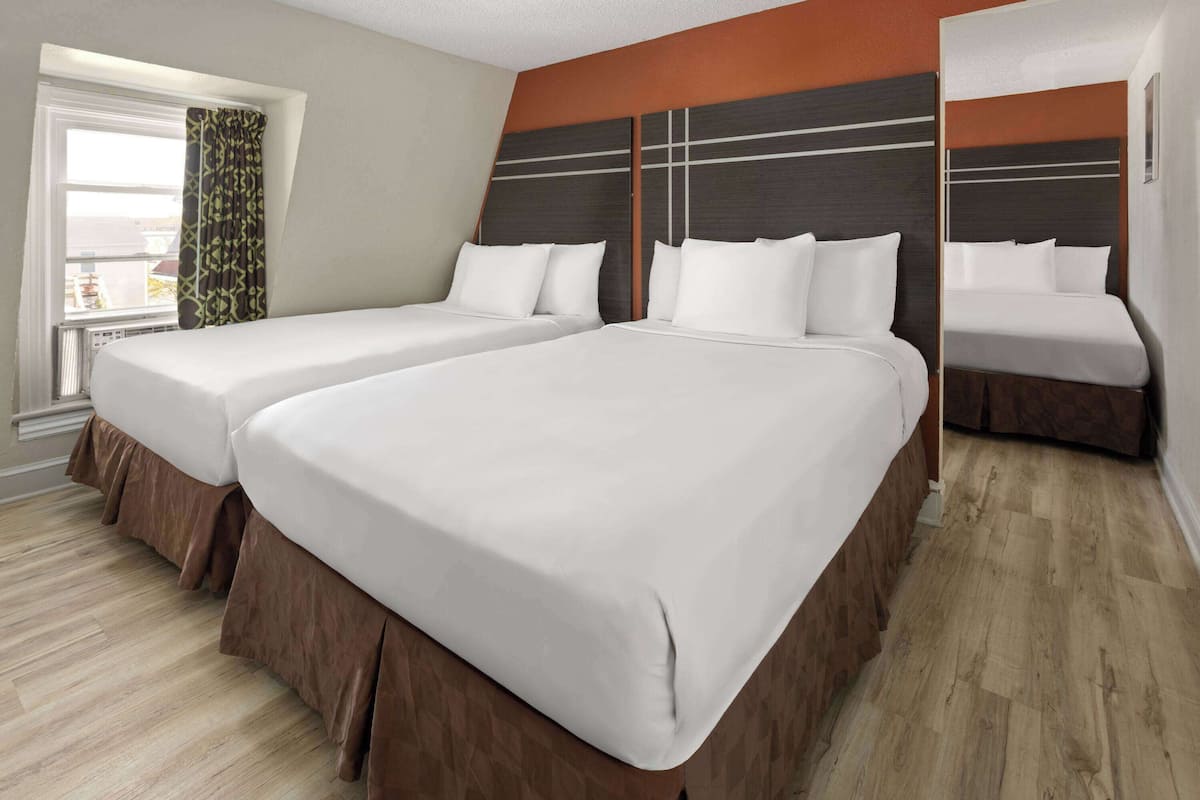 Room, Multiple Beds, Non Smoking | 1 bedroom, premium bedding, free WiFi