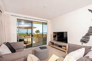 Apartment, 1 Bedroom, Ocean View | Living area | 42-inch flat-screen TV with satellite channels, TV