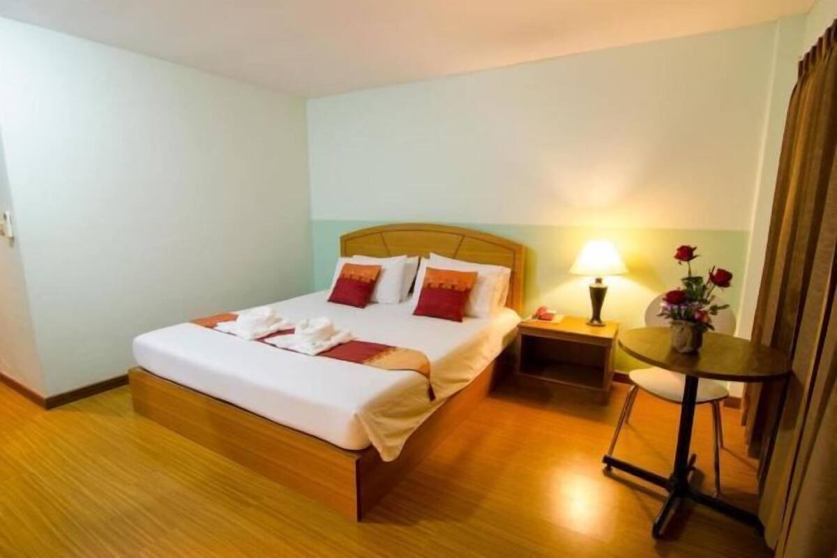 Desk, blackout drapes, rollaway beds (surcharge), WiFi (free)