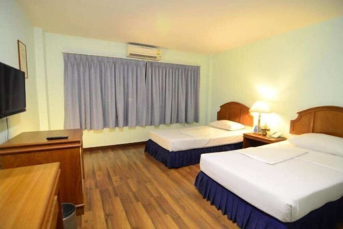 Desk, blackout drapes, rollaway beds (surcharge), WiFi (free)
