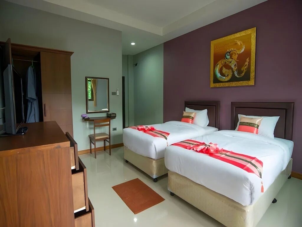 deluxe double or twin room | minibar, desk, blackout curtains, iron/ironing board