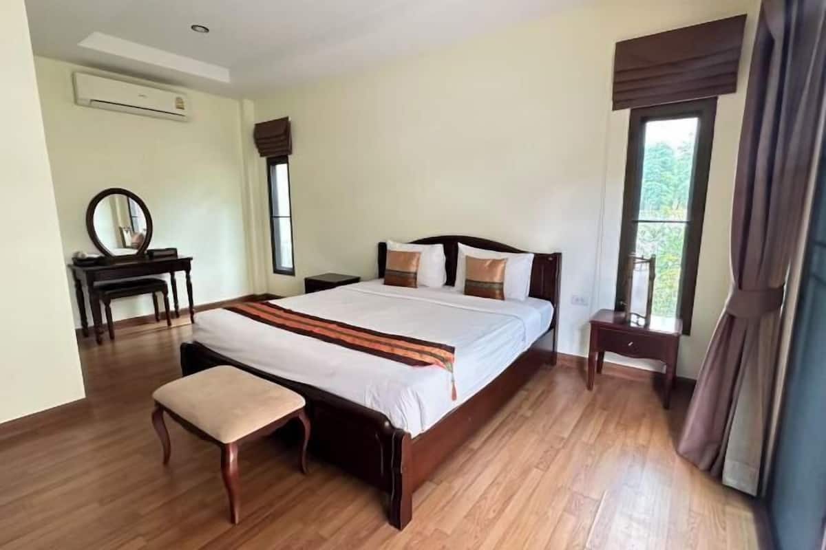 Minibar, desk, blackout curtains, iron/ironing board