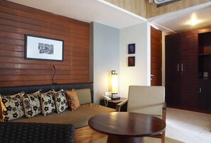Habitación, vistas al jardín (Garden Pavilion) | Minibar, caja fuerte, escritorio y cortinas opacas