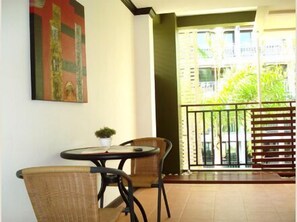 デラックス ルーム | リビング エリア | 薄型テレビ