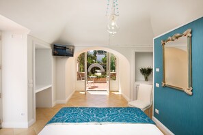 Junior suite, niet-roken, terras | 1 slaapkamer, een minibar, een kluis op de kamer