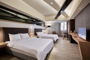 Habitación cuádruple Deluxe | Escritorio y wifi gratis