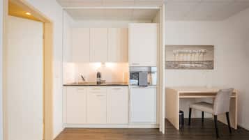 Deluxe Apartment, Kitchen | Private kitchen