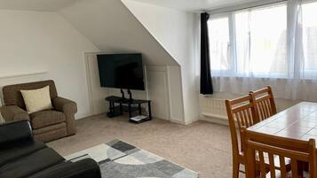 Suite, Garden View | Living area