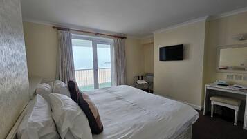 Desk, laptop workspace, blackout drapes, soundproofing